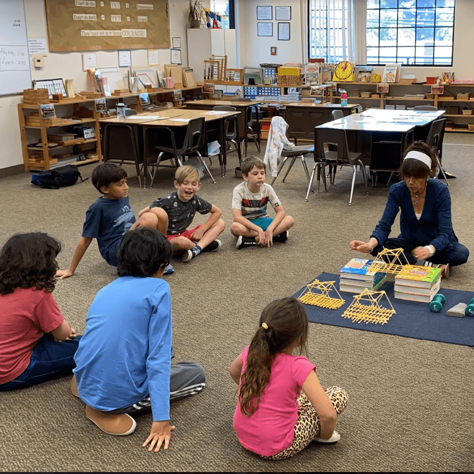 Teacher leading Montessori circle time at Mission Viejo campus